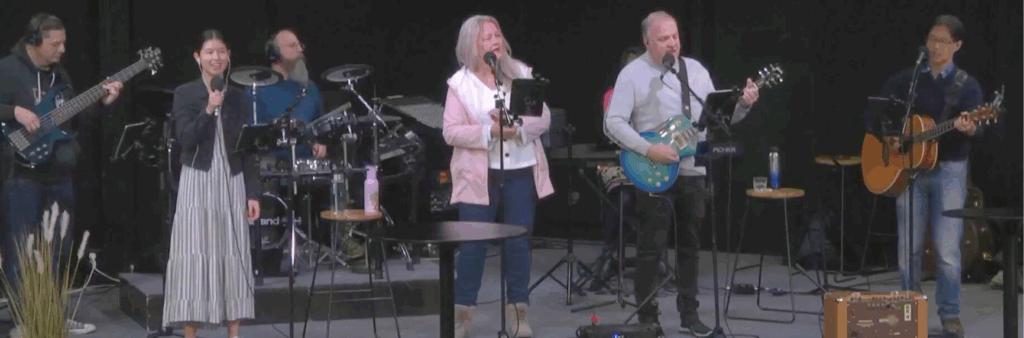 Worship music team singing and playing instruments at Gateways Christian Fellowship church in Palmerston North